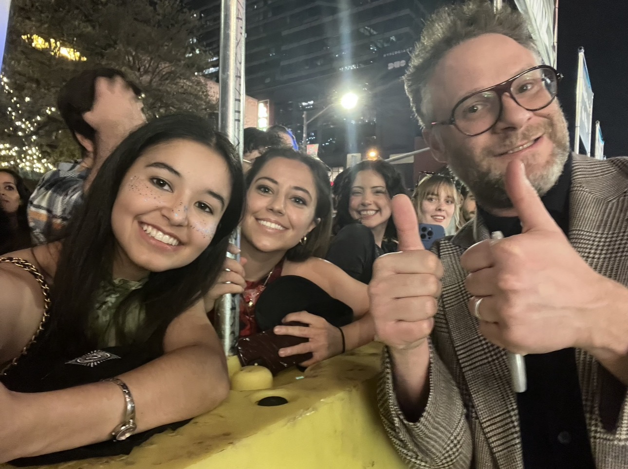 Olivia and her sister with Seth Rogan